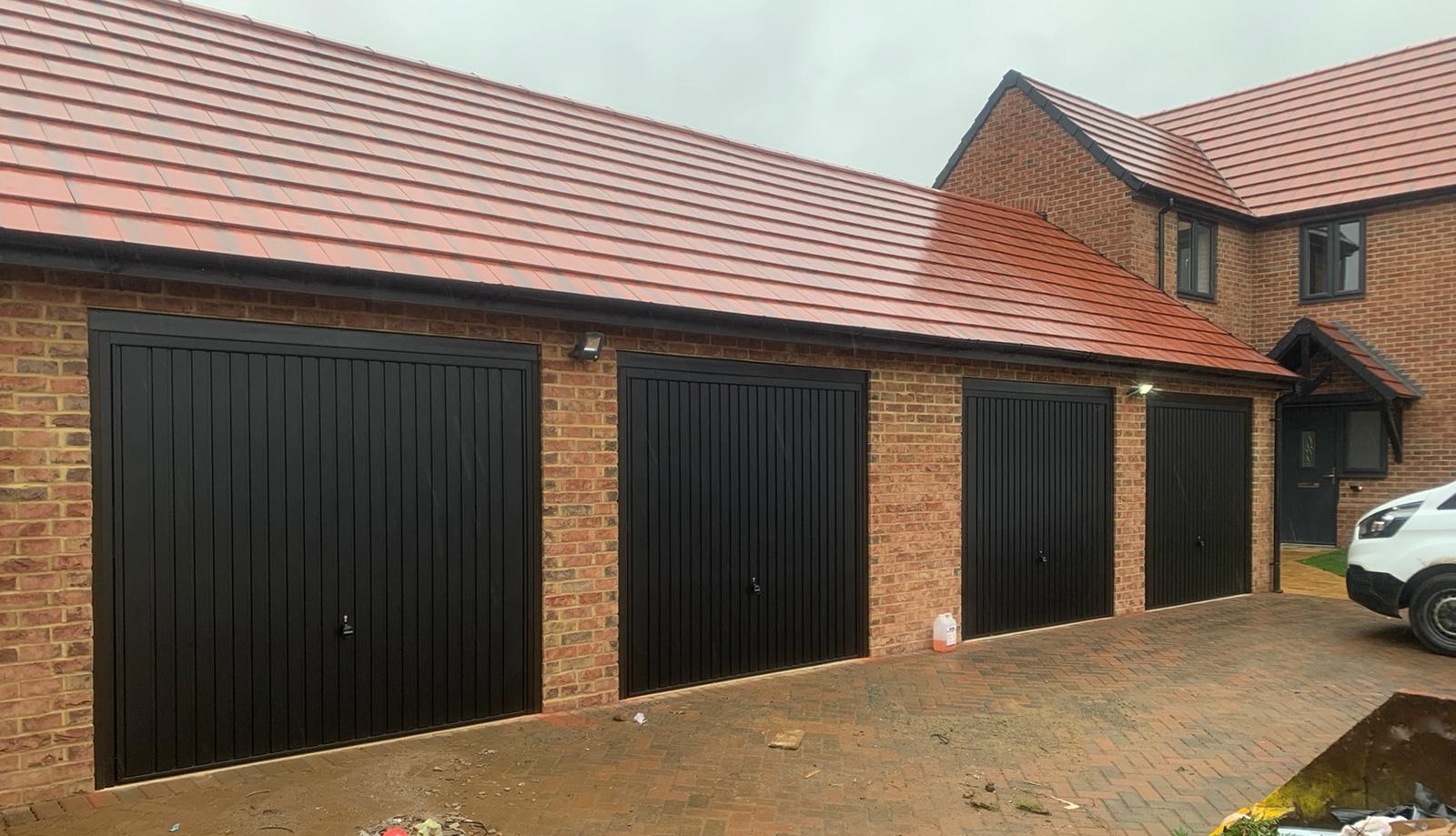 and Hormann Vertical Black Up and Over garage door garage door Watford