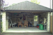 garage with lawn chairs